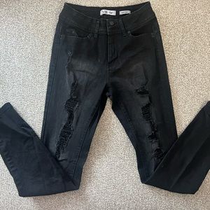 Skinny/Mid rise Black ripped jeans